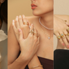 Woman wearing a delicate Yumeira 18K gold-plated bracelet after a workout in the UAE