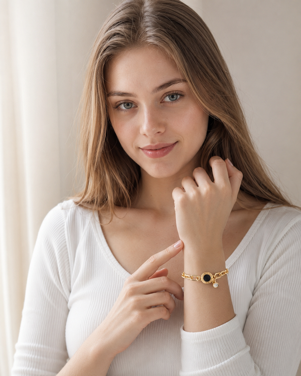 Aria Noir Charm Bracelet lifestyle image, 18K gold-plated adjustable waterproof bracelet with black charm for women in UAE